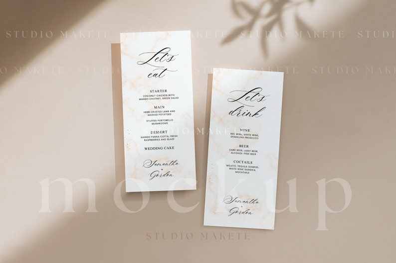 May include: Two beige cards with a marble texture and gold accents. The text on the cards reads "Let's eat" and "Let's drink". The cards list food and drink options for a wedding reception. The text at the bottom of the cards reads "Samantha Garden".