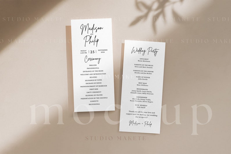 May include: Two white cards with black text. The first card lists the wedding ceremony order, including the processional, entrance of the bride, reading, exchange of vows, and more. The second card lists the wedding party, including the officiant, parents of the bride and groom, bridesmaids, groomsmen, and more. The text on the cards reads "Madison and Phipp" and "Wedding Party".
