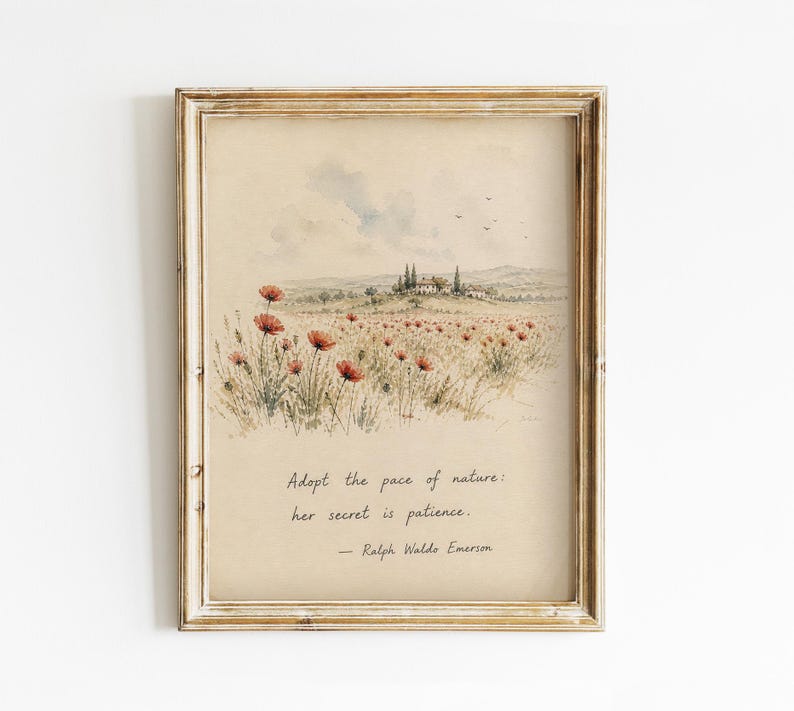 May include: Framed art print featuring a watercolor landscape of a field of red poppies and a distant villa. The print has a vintage aesthetic with a quote: "Adopt the pace of nature: her secret is patience." by Ralph Waldo Emerson.