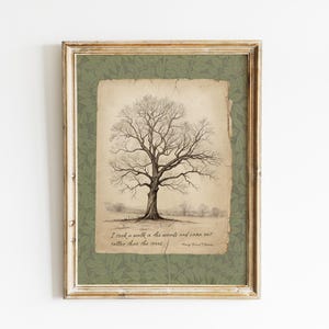 May include: Framed art print with a pen and ink drawing of a tree with bare branches. The artwork is set against a green patterned background and includes the quote, "I took a walk in the woods and came out taller than the trees."