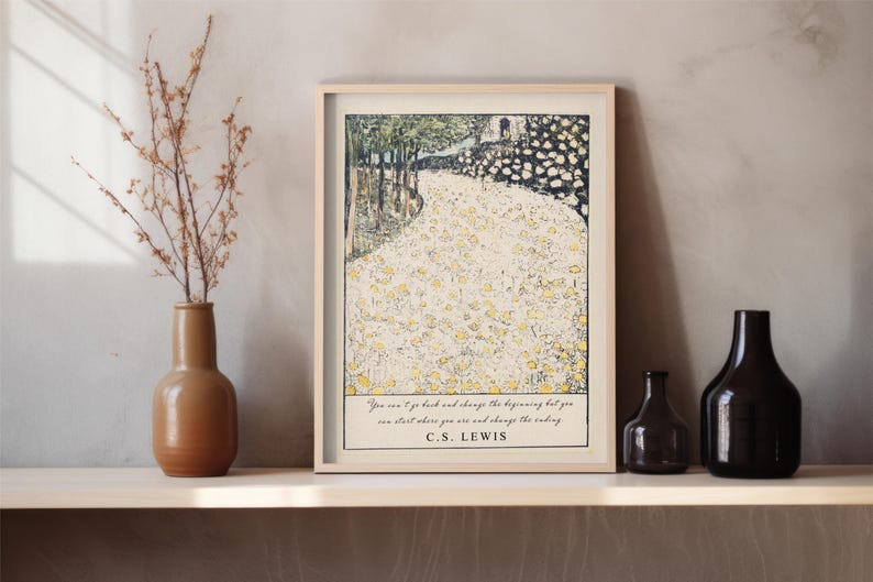 May include: A framed print with a quote by C.S. Lewis: "You can't go back and change the beginning, but you can start where you are and change the ending." The print features a stylized illustration of a path through a forest.