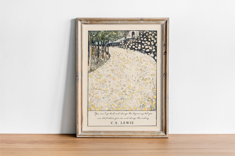 May include: A framed print with a quote by C.S. Lewis: "You can't go back and change the beginning but you can start where you are and change the ending." The print features a stylized illustration of a path winding through a field of yellow flowers.
