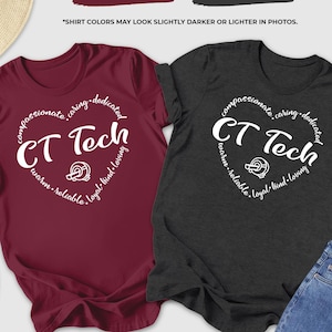 May include: Two t-shirts, one maroon and one dark grey heather, with the text "CT Tech" inside a heart-shaped design. The design includes words like "compassionate" and "reliable". The shirts are displayed with jeans, shoes, and accessories.