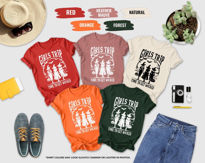 a collection of clothing items, accessories, and a plant, arranged in a visually appealing manner.