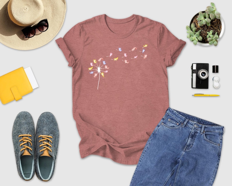 a women's t - shirt, jeans, hat, sunglasses, and other