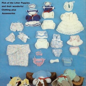 May include: Crocheted puppy dog toys with various outfits and accessories. The puppies are laying down on a wooden log. The outfits include a sailor dress, a white dress, a pink dress, and a blue and white striped dress. The accessories include a bib, a diaper, and a bone.