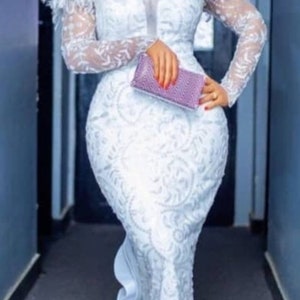 African lace, mermaid  white dress  with feathers. African prom dress, wedding dress, Reception dress.Ready to wear clothes
