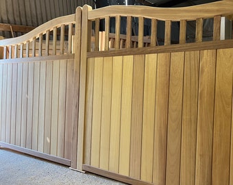 Hardwood Driveway Gates In Iroko Or Sapele, Custom Gate Sizes Made To Order, Curve Top Traditional Wooden Gate Design: The Emperor’s Gates.