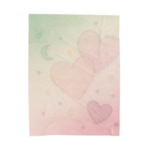 May include: A rectangular blanket featuring a soft pastel gradient background transitioning from light green to pink. The design includes three large heart shapes and scattered small stars in various pastel colors, along with a crescent moon icon.