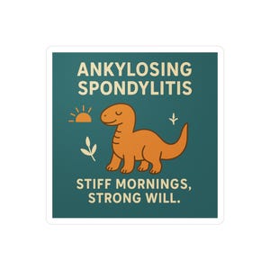 May include: Square sticker with a teal background and white border. The sticker features an orange dinosaur illustration with the text "ANKYLOSING SPONDYLITIS" above and "STIFF MORNINGS, STRONG WILL" below. A sun and leaves are also included.