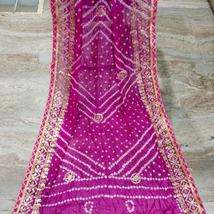 bandhani dupatta, bandhej dupatta, pink bandhani dupatta, gota patti dupatta, festive dupatta, traditional dupatta, Indian ethnic dupatta, wedding wear dupatta, rajasthani dupatta, gujarati bandhani, tie dye dupatta, lehenga dupatta, anarkali dupatta, silk bandhani dupatta
Bandhani Dupatta
Gota Patti Dupatta
Pink Dupatta
Indian Ethnic Wear
Festive Dupatta
Wedding Dupatta
Bandhej Dupatta
Rajasthani Dupatta
Traditional Dupatta
Tie Dye Dupatta
Party Wear Dupatta
Handmade Dupatta
Bandhej Dupatta