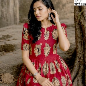 Indian Kalamkari Dress, Red Midi Dress Women, Ethnic Printed Dress, Bohemian Style Outfit, Festival Wear Dress
kalamkari dress
indian midi dress
red cotton dress
boho dress women
ethnic dress india
printed midi dress
summer cotton dress
bohemian outfit
handmade dress
festival dress women
casual ethnic wear
indo western dress
unique print dress
kalamkari dress
red midi dress
boho dress
cotton dress
ethnic dress
summer dress
indo western
printed dress
handmade dress
women dress
unique print