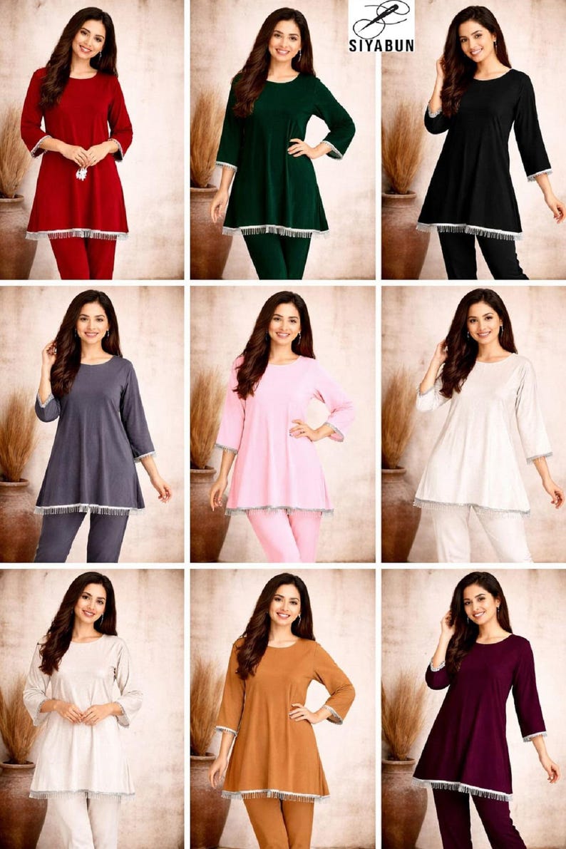 May include: A collection of women's loungewear sets in various colors, including red, green, black, gray, pink, white, brown, and purple. Each set features a tunic top with a round neckline and three-quarter sleeves, paired with matching pants. The tops have a decorative trim.