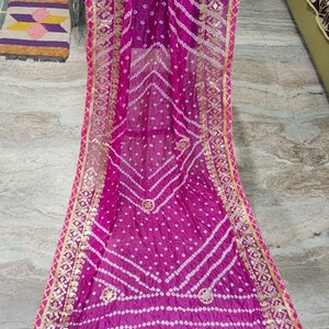 bandhani dupatta, bandhej dupatta, pink bandhani dupatta, gota patti dupatta, festive dupatta, traditional dupatta, Indian ethnic dupatta, wedding wear dupatta, rajasthani dupatta, gujarati bandhani, tie dye dupatta, lehenga dupatta, anarkali dupatta, silk bandhani dupatta
Bandhani Dupatta
Gota Patti Dupatta
Pink Dupatta
Indian Ethnic Wear
Festive Dupatta
Wedding Dupatta
Bandhej Dupatta
Rajasthani Dupatta
Traditional Dupatta
Tie Dye Dupatta
Party Wear Dupatta
Handmade Dupatta
Bandhej Dupatta