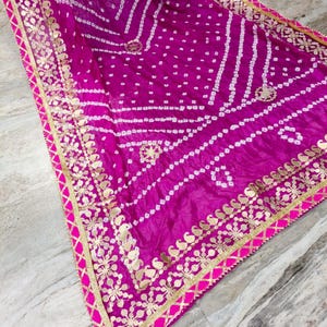 bandhani dupatta, bandhej dupatta, pink bandhani dupatta, gota patti dupatta, festive dupatta, traditional dupatta, Indian ethnic dupatta, wedding wear dupatta, rajasthani dupatta, gujarati bandhani, tie dye dupatta, lehenga dupatta, anarkali dupatta, silk bandhani dupatta
Bandhani Dupatta
Gota Patti Dupatta
Pink Dupatta
Indian Ethnic Wear
Festive Dupatta
Wedding Dupatta
Bandhej Dupatta
Rajasthani Dupatta
Traditional Dupatta
Tie Dye Dupatta
Party Wear Dupatta
Handmade Dupatta
Bandhej Dupatta