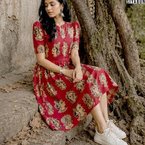 Handmade Red Cotton Dress, Kalamkari Print Midi Dress, Ethnic Indian Wear, Casual Boho Dress, Summer Outfit Women
kalamkari dress
indian midi dress
red cotton dress
boho dress women
ethnic dress india
printed midi dress
summer cotton dress
bohemian outfit
handmade dress
festival dress women
casual ethnic wear
indo western dress
unique print dress
kalamkari dress
red midi dress
boho dress
cotton dress
ethnic dress
summer dress
indo western
festival dress
casual wear
women dress
unique print