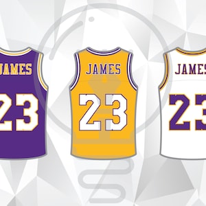 May include: Three basketball jerseys in purple, gold, and white, each with the name "JAMES" and the number "23". The jerseys are sleeveless and feature contrasting color accents. The image includes the text "SMALL BATCH" and "LAYERED SVG, PNG, & AI FILE".