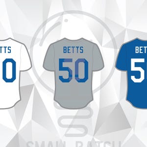 May include: Three baseball jerseys in white, gray, and blue, each with the name "BETTS" and the number "50" in a contrasting color. The image includes the text "SMALL BATCH" and "LAYERED SVG, PNG, & AI FILE".