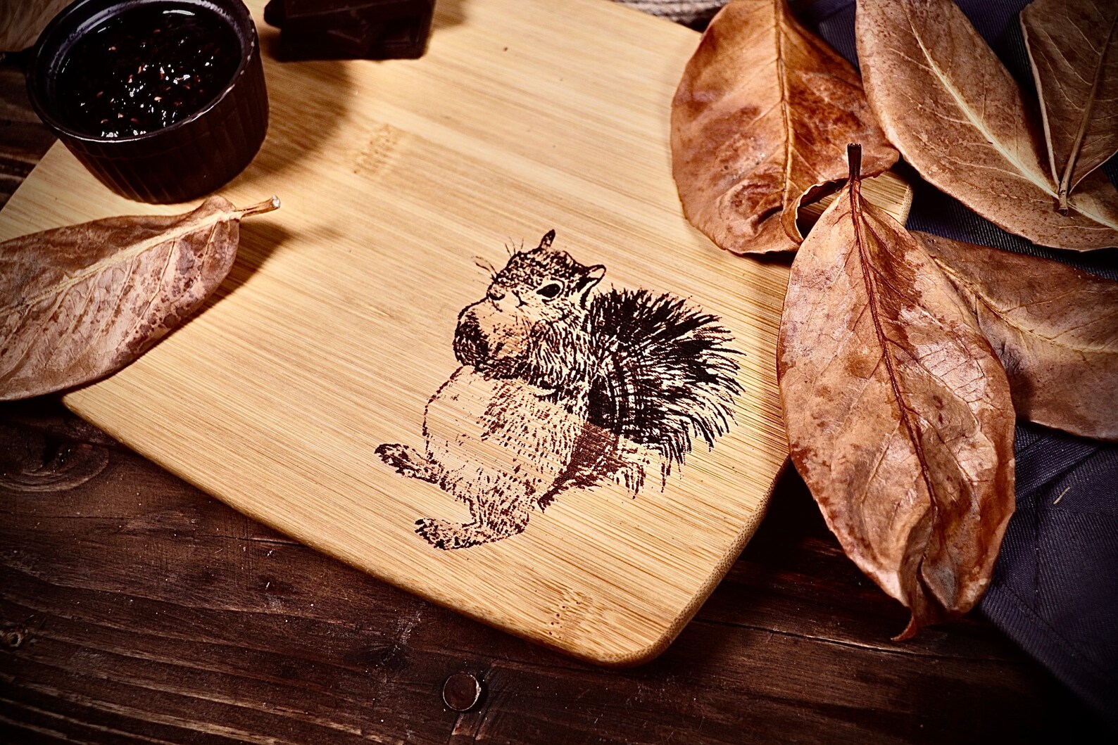 cutting board with an image of a squirrel engraved.