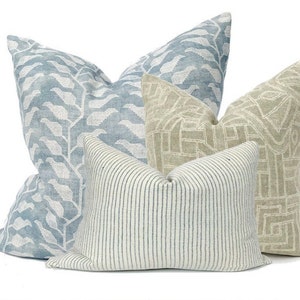 Curated sofa pillow cover combo, light blue linen floral print, griege geometric, blue and white stripe throw pillow, modern farmhouse style