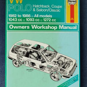 May include: A Haynes Owners Workshop Manual for VW Polo Hatchback, Coupe & Saloon/Classic models from 1982 to 1986. The cover features a detailed illustration of a car and includes the text "Owners Workshop Manual". The book is green, white, yellow, and red.