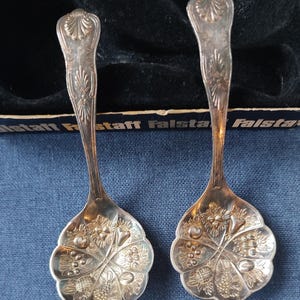 A Set of Two Falstaff Silver Plated Serving Spoons
