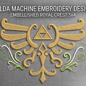 May include: A machine embroidery design featuring a gold royal crest with a central triangle emblem, flanked by stylized wings and decorative green and white swirls. The text reads ZELDA MACHINE EMBROIDERY DESIGN EMBELLISHED ROYAL CREST 5x4.
