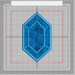 May include: A blue, octagonal-shaped gem with a textured surface. The gem is centered on a white grid.