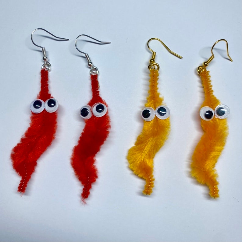 Worm on a string earrings Etsy
