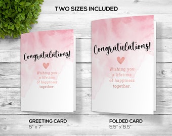 May include: Two pink watercolor greeting cards with the text "Congratulations!" and "Wishing you a lifetime of happiness together." The smaller card is 5 inches by 7 inches and the larger card is 5.5 inches by 8.5 inches.