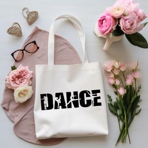 Shopping bag for dance enthusiasts with the inscription &quot;DANCE&quot; and dancing silhouettes in different colors