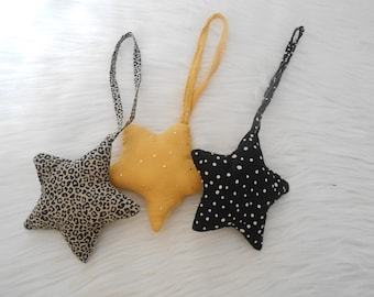 Star cuddly toy for hanging cotton gauze, and other fabrics for awakening arch