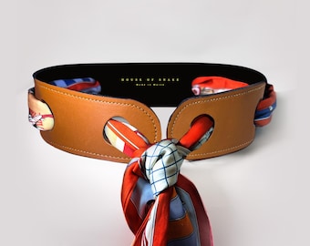 Cinturón reversible de piel, color negro y marrón.