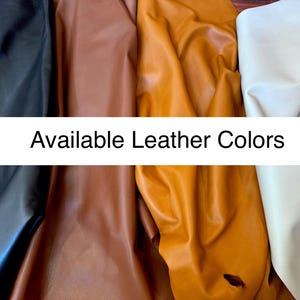 May include: A selection of leather in various colors, including black, brown, and tan. The image displays the available leather colors, with the text "Available Leather Colors" in a white banner across the center.