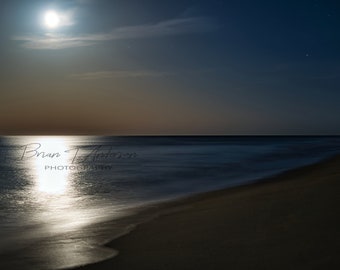Beautiful moonrise and moon reflection on the ocean at 10pm at the Outer Banks NC.  The big signature will be removed upon purchase.