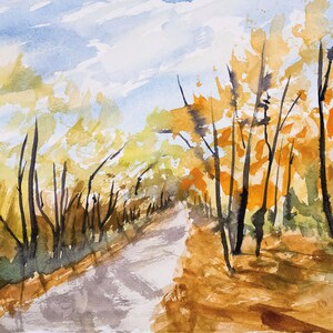 May include: A watercolor painting of a path through a forest in autumn. The trees are a mix of yellow, orange, and green, and the path is lined with fallen leaves. The sky is a light blue with some white clouds.