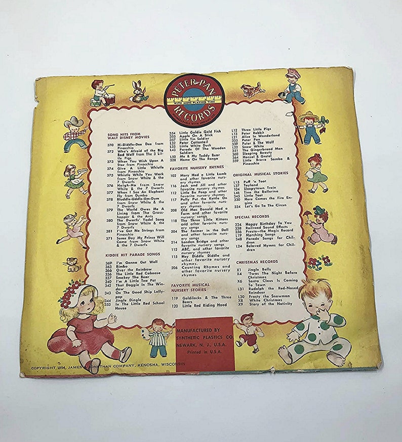 May include: A vintage record album cover featuring a colorful illustration of children playing music. The cover is yellow with a red border and features the text "Peter Pan Records with More Playing Time".