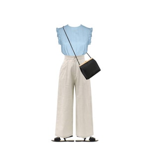 May include: A light blue ruffled blouse with a black crossbody bag and wide-legged beige pants. The outfit is completed with black sandals.