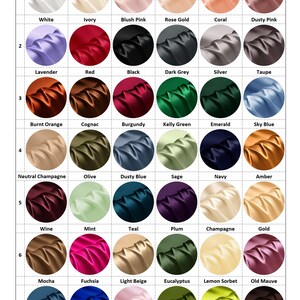 May include: A colour chart displaying 42 fabric swatches in a range of hues, such as white, ivory, red, black, and gold. Each swatch is labelled with its colour name. The swatches are arranged in a grid.
