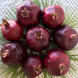 Large dried pomegranates. enhanced. Size  3"-3.5"