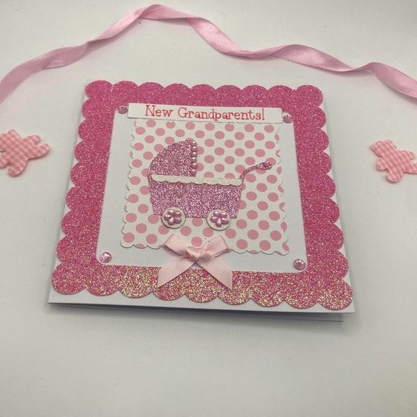 Handmade die cut new grandparents or grandparent of a baby girl card, pink glitter pram, 5 x 5 ins