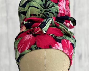 Kahuku Kutie tropical print stretch scrub cap stretchy scrub hat for long or short hair high bun ponytail messy bun euro cap