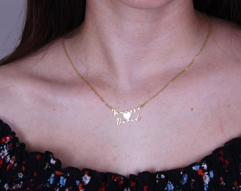 May include: Gold necklace with a heart charm and the names "Vanessa" and "David" written in cursive.