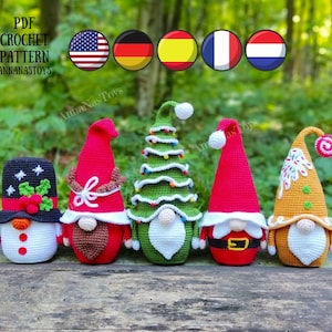 May include: Five crocheted Christmas gnomes, including a snowman, a gingerbread gnome, a Santa gnome, a Christmas tree gnome, and a reindeer gnome. The gnomes are all wearing hats and have beards. The image includes the text "PDF CROCHET PATTERN ANNANASTOYS".
