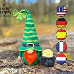 May include: Crochet pattern for a green and white striped gnome with a green hat, orange beard, and a pot of gold. The pattern is available in English, German, Spanish, French, and Dutch.