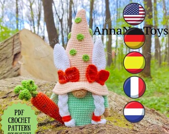 May include: Crochet pattern for a green and pink gnome holding a carrot. The pattern is available in PDF format and is sold by Anna N Toys. The image also includes flags of the United States, Germany, Spain, France, and the Netherlands.