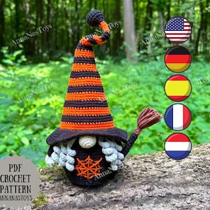 May include: A handmade crochet gnome with a black body, white beard, and a pointed hat with orange and black stripes. The gnome has a spiderweb design on its belly and a broom. The text "PDF CROCHET PATTERN ANNANASTOYS" is visible.