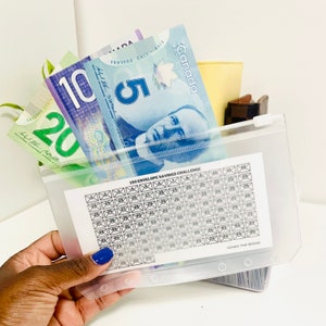 Boîte D'économie D'argent Rouge Avec Clé Avec Pièces Et Billets En Euros