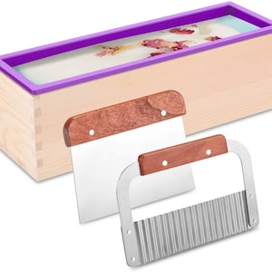 May include: A wooden soap mold with a purple silicone insert, a stainless steel soap cutter with a wooden handle, and a stainless steel soap scraper with a wooden handle.