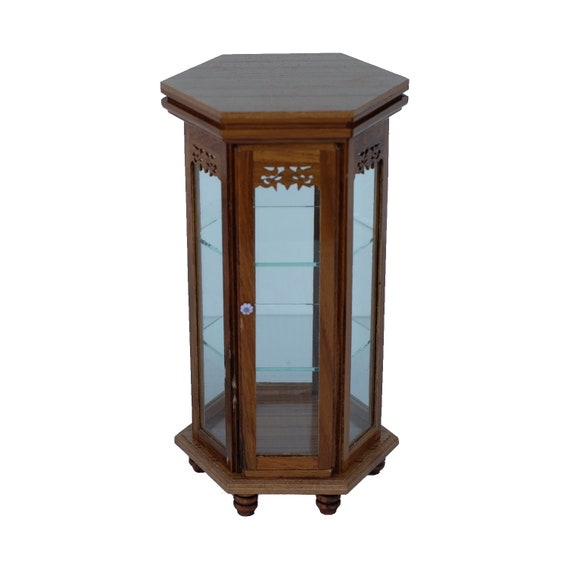 Hexagon curio cabinet deals